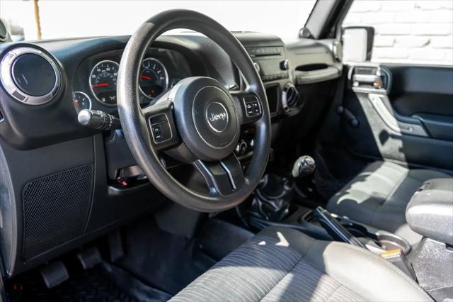 used 2012 Jeep Wrangler Unlimited car, priced at $17,999