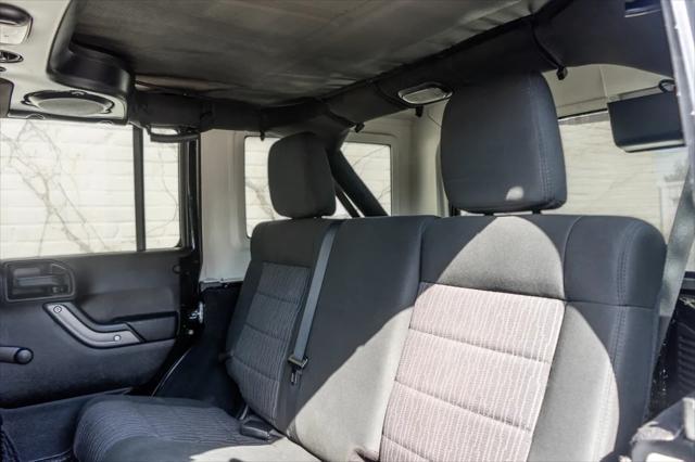 used 2012 Jeep Wrangler Unlimited car, priced at $17,999