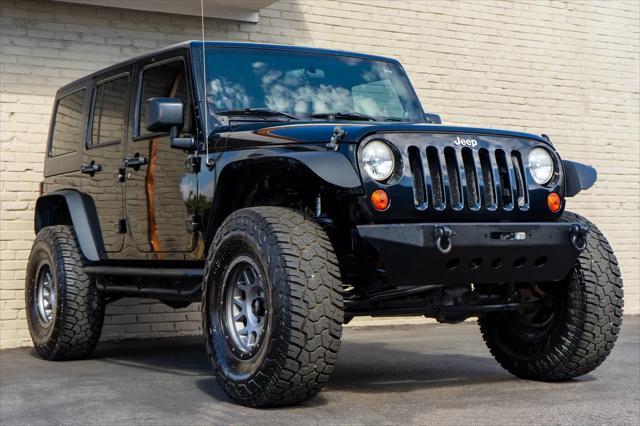 used 2012 Jeep Wrangler Unlimited car, priced at $17,999