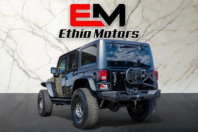 used 2012 Jeep Wrangler Unlimited car, priced at $17,999
