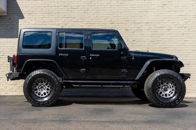 used 2012 Jeep Wrangler Unlimited car, priced at $17,999