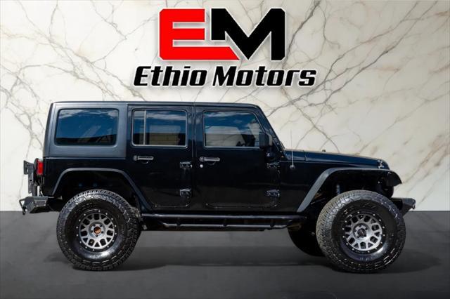 used 2012 Jeep Wrangler Unlimited car, priced at $17,999