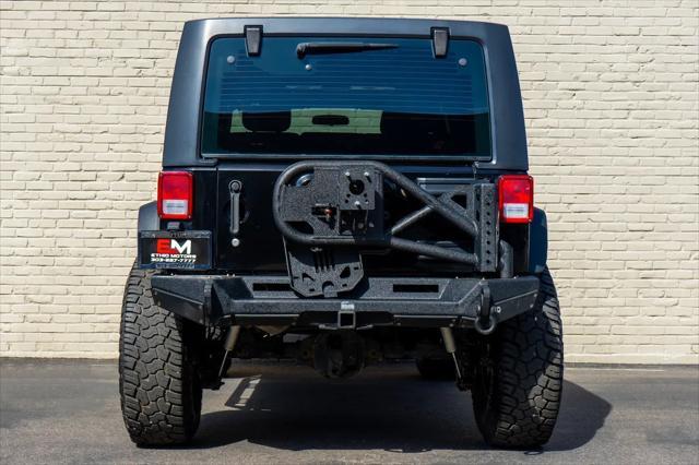 used 2012 Jeep Wrangler Unlimited car, priced at $17,999