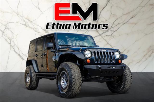 used 2012 Jeep Wrangler Unlimited car, priced at $17,999