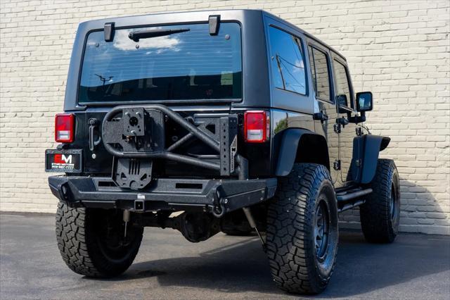 used 2012 Jeep Wrangler Unlimited car, priced at $17,999