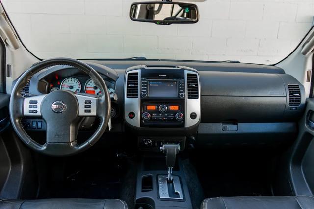 used 2014 Nissan Frontier car, priced at $18,399