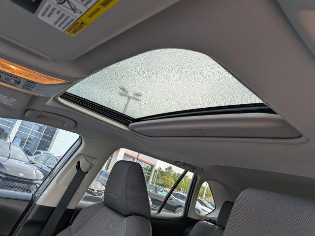used 2021 Toyota RAV4 Hybrid car, priced at $27,500