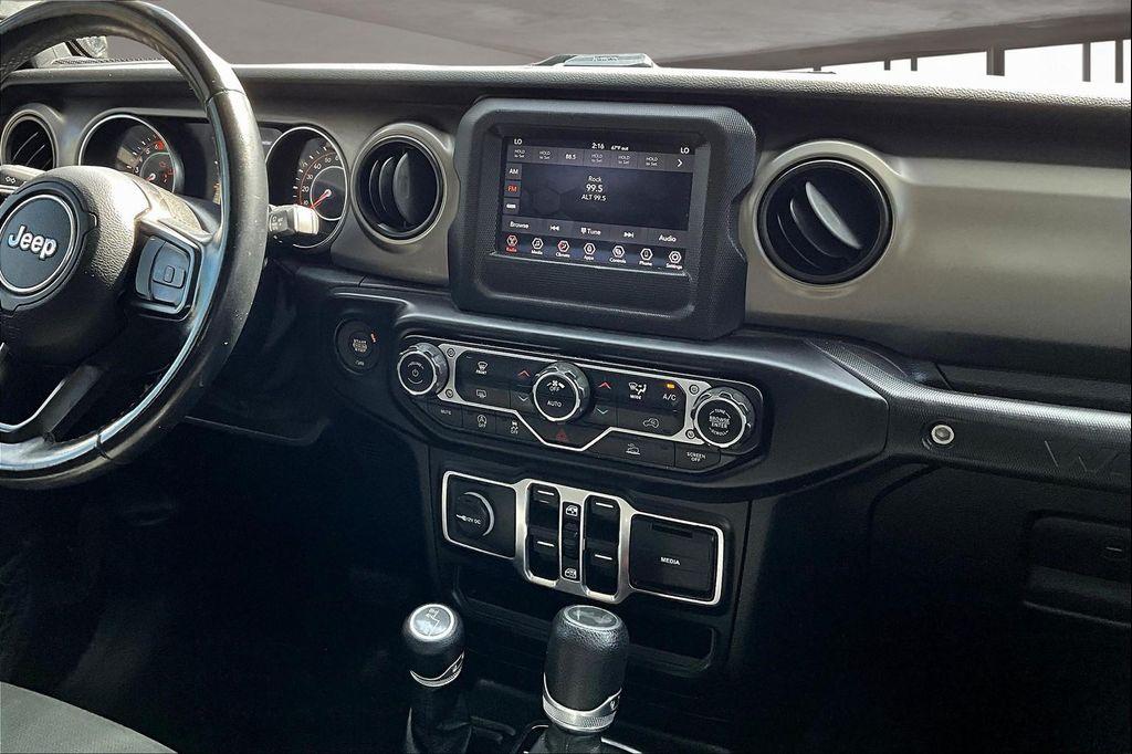 used 2021 Jeep Wrangler Unlimited car, priced at $27,827