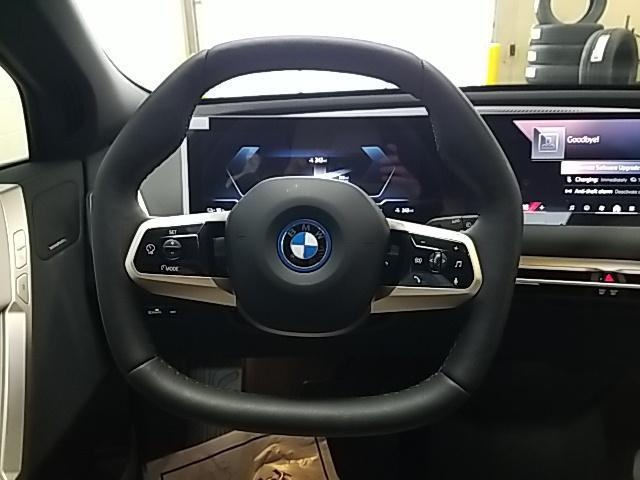new 2024 BMW iX car, priced at $97,045