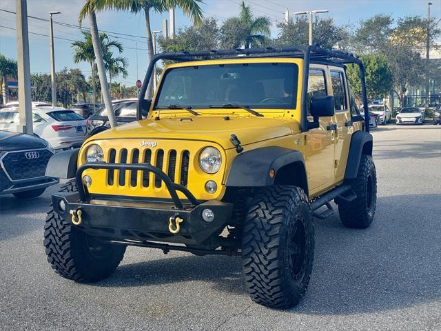 used 2015 Jeep Wrangler Unlimited car, priced at $16,895