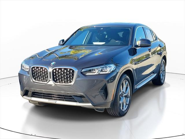 used 2022 BMW X4 car, priced at $39,425