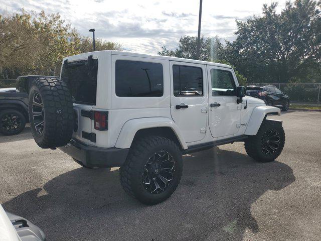 used 2015 Jeep Wrangler Unlimited car, priced at $14,352