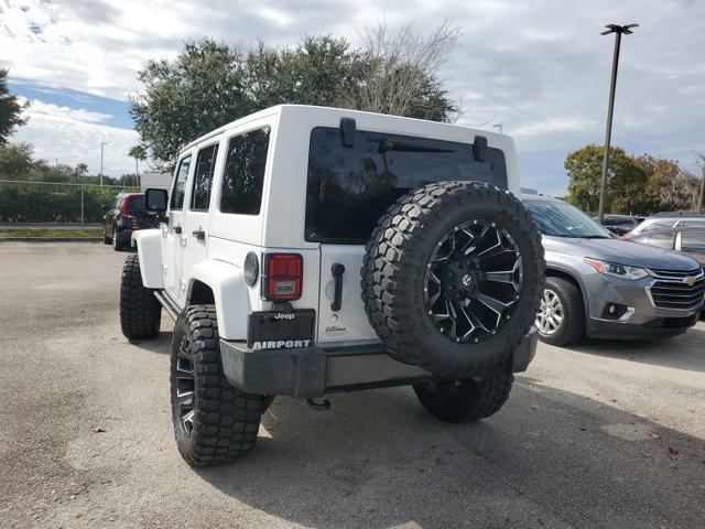 used 2015 Jeep Wrangler Unlimited car, priced at $14,352