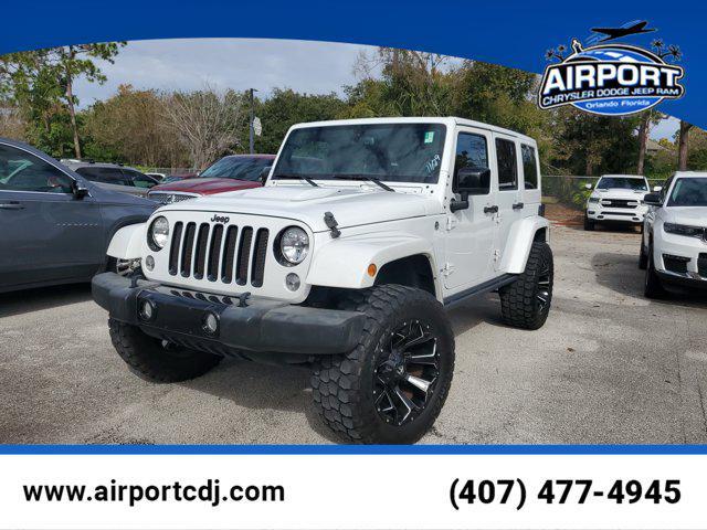used 2015 Jeep Wrangler Unlimited car, priced at $14,352