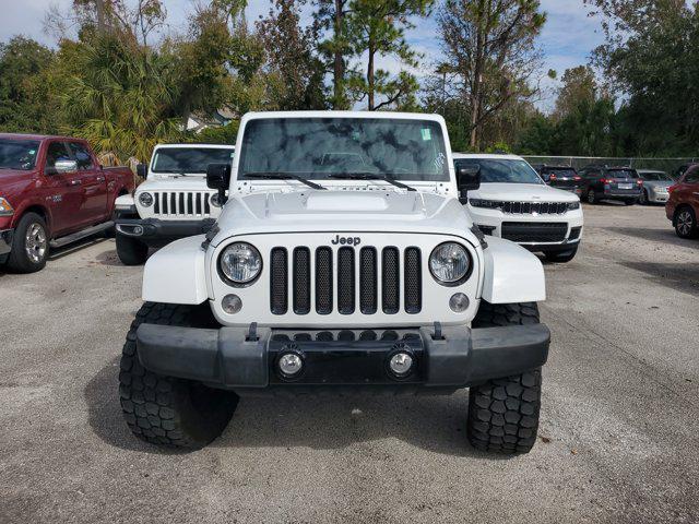 used 2015 Jeep Wrangler Unlimited car, priced at $14,352