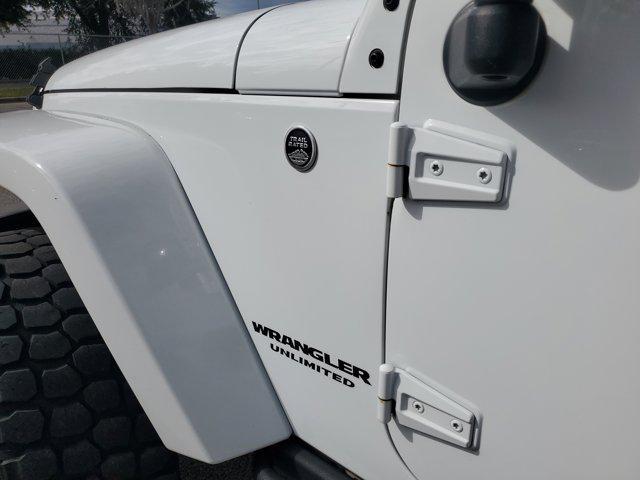 used 2015 Jeep Wrangler Unlimited car, priced at $14,352