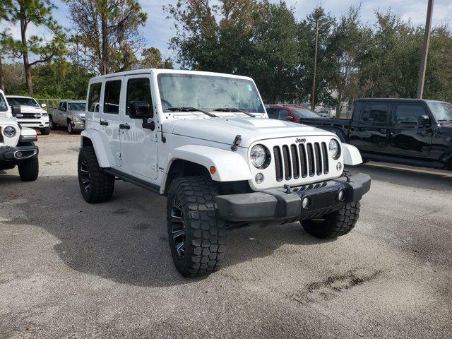 used 2015 Jeep Wrangler Unlimited car, priced at $14,352