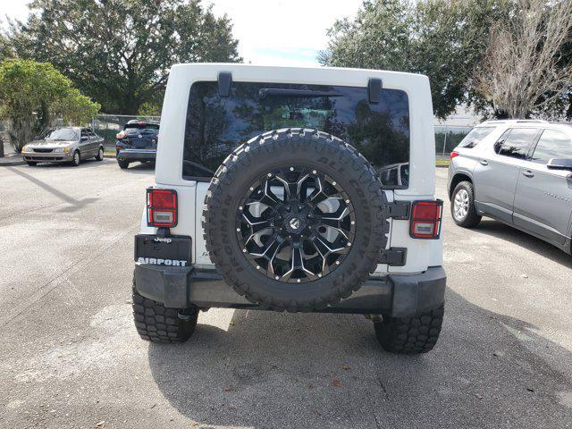 used 2015 Jeep Wrangler Unlimited car, priced at $14,352