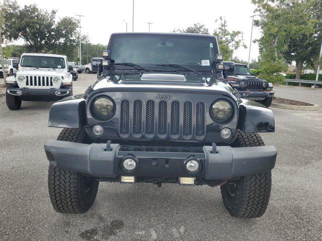 used 2015 Jeep Wrangler Unlimited car, priced at $16,549