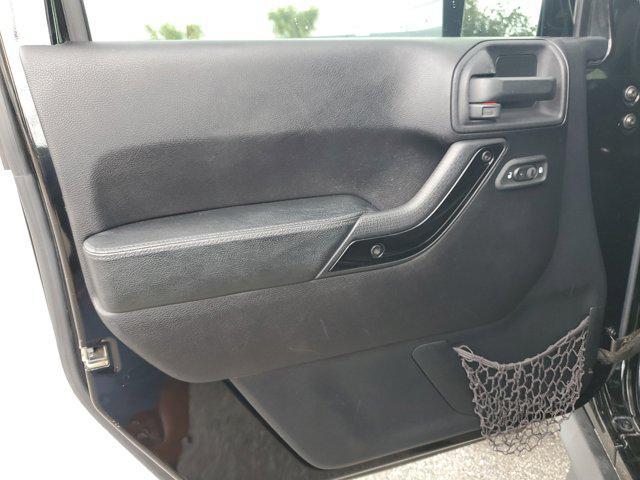 used 2015 Jeep Wrangler Unlimited car, priced at $16,549