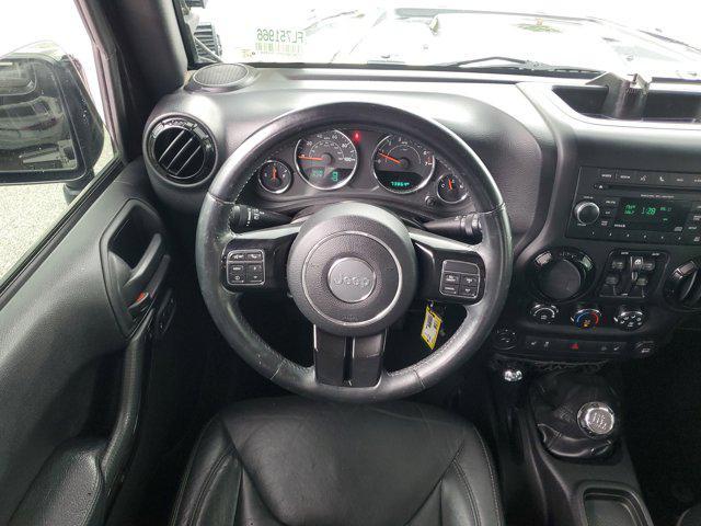 used 2015 Jeep Wrangler Unlimited car, priced at $16,549