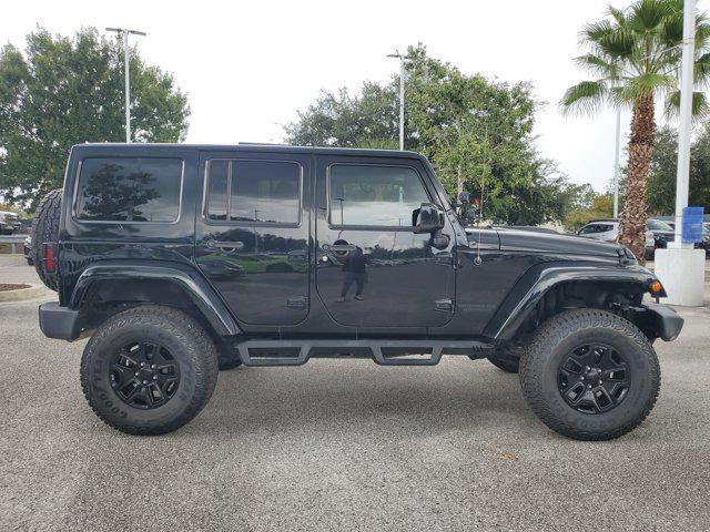 used 2015 Jeep Wrangler Unlimited car, priced at $16,549