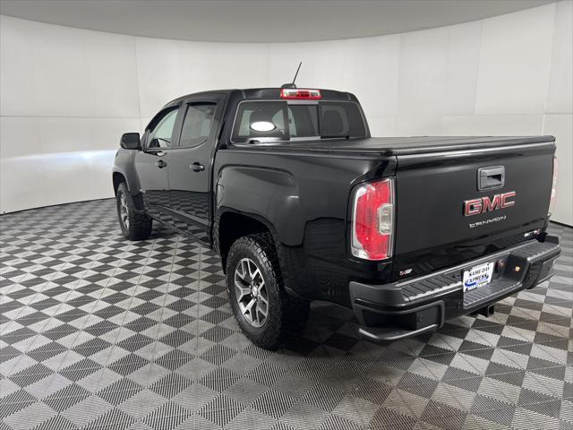 used 2021 GMC Canyon car, priced at $29,566