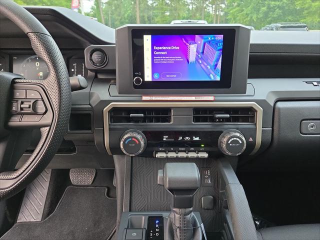 used 2025 Toyota Tacoma car, priced at $35,303