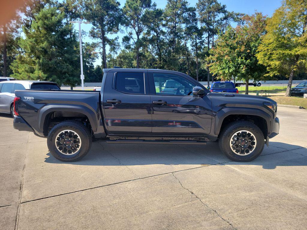 used 2025 Toyota Tacoma car, priced at $49,496