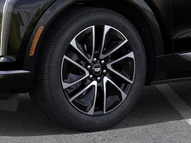 new 2025 Cadillac OPTIQ car, priced at $50,990