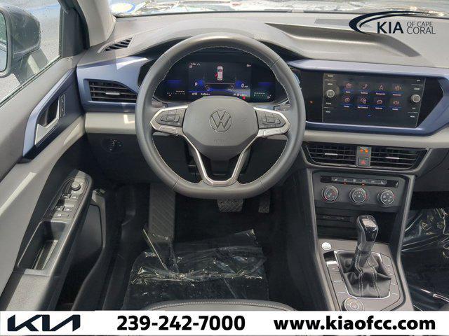 used 2022 Volkswagen Taos car, priced at $18,057