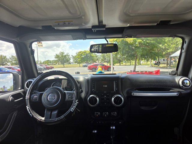 used 2014 Jeep Wrangler Unlimited car, priced at $17,331