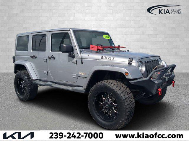 used 2014 Jeep Wrangler Unlimited car, priced at $16,891