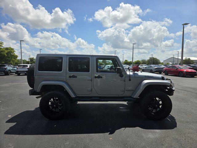 used 2014 Jeep Wrangler Unlimited car, priced at $17,331