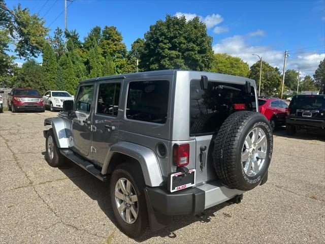 used 2013 Jeep Wrangler Unlimited car, priced at $13,995