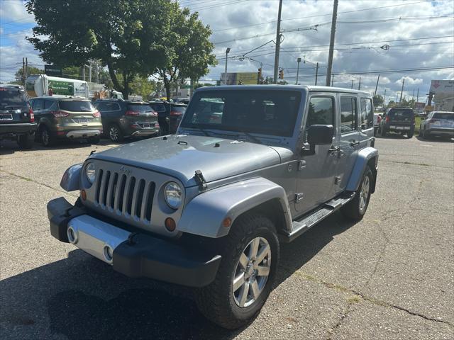 used 2013 Jeep Wrangler Unlimited car, priced at $13,995