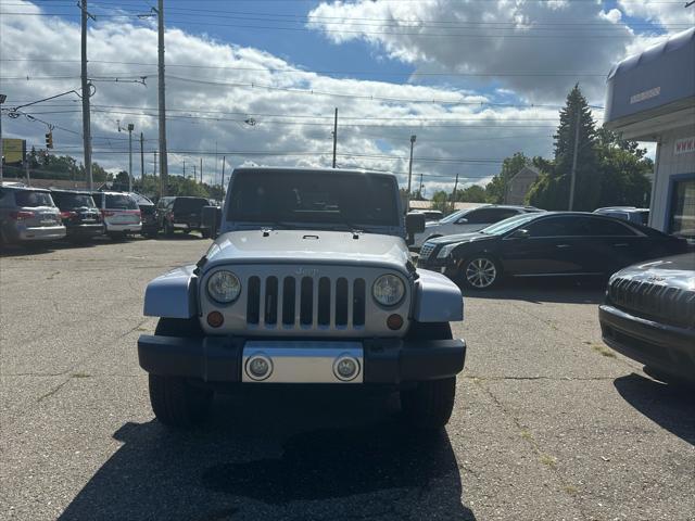 used 2013 Jeep Wrangler Unlimited car, priced at $13,995