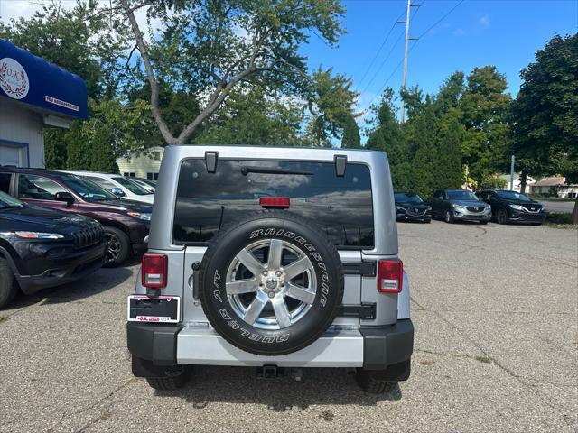 used 2013 Jeep Wrangler Unlimited car, priced at $13,995