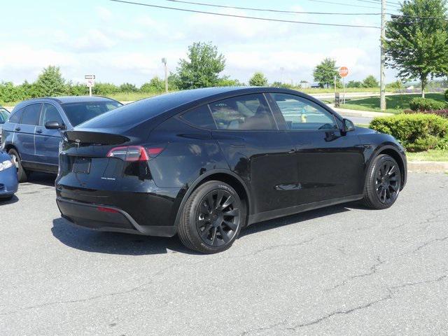 used 2023 Tesla Model Y car, priced at $30,489