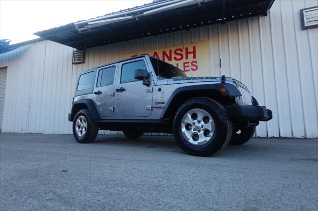 used 2015 Jeep Wrangler Unlimited car, priced at $17,975