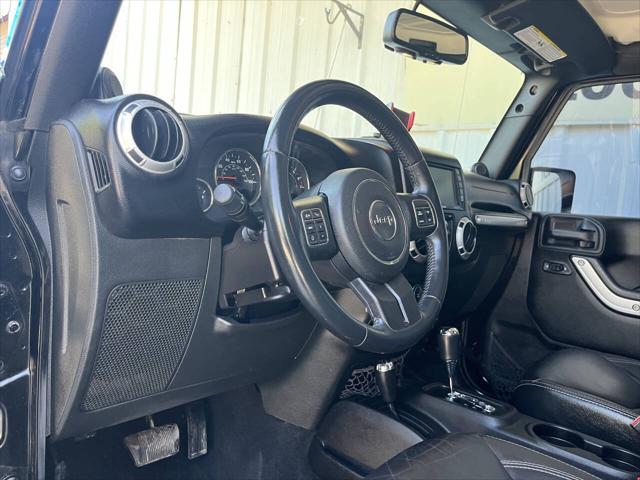 used 2014 Jeep Wrangler Unlimited car, priced at $16,975
