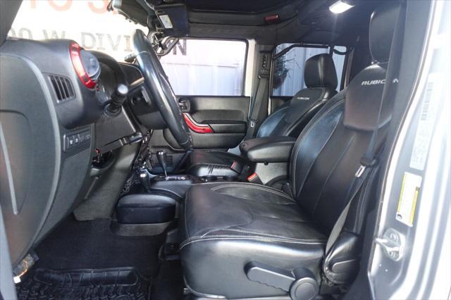 used 2015 Jeep Wrangler Unlimited car, priced at $22,975