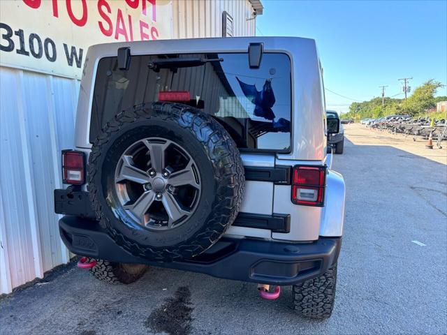 used 2018 Jeep Wrangler JK Unlimited car, priced at $25,975