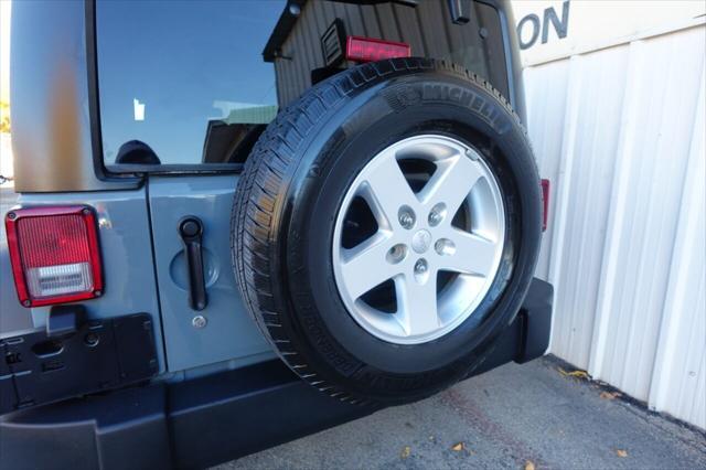 used 2015 Jeep Wrangler Unlimited car, priced at $17,975