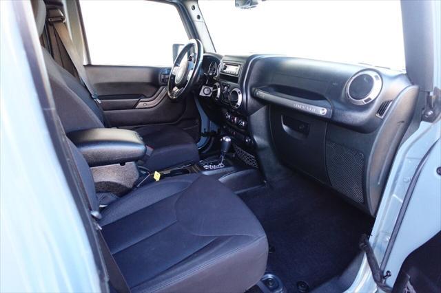 used 2015 Jeep Wrangler Unlimited car, priced at $17,975