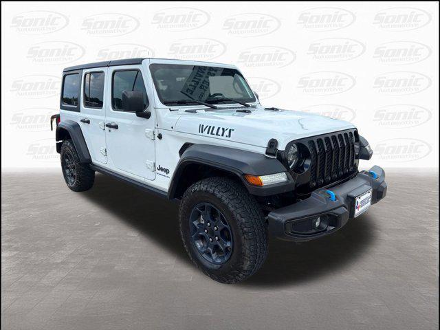 used 2023 Jeep Wrangler 4xe car, priced at $27,497