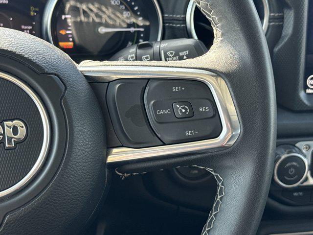 used 2023 Jeep Wrangler 4xe car, priced at $31,799