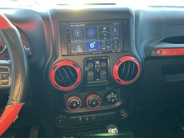 used 2016 Jeep Wrangler Unlimited car, priced at $16,499