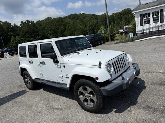 used 2017 Jeep Wrangler Unlimited car, priced at $23,438