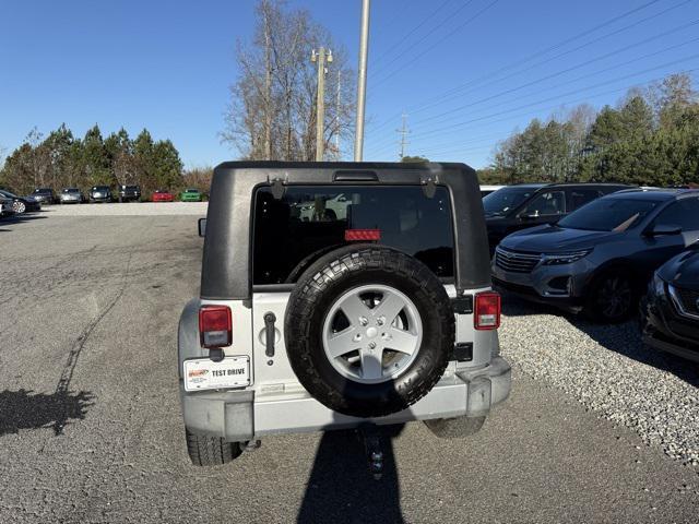 used 2010 Jeep Wrangler Unlimited car, priced at $7,932